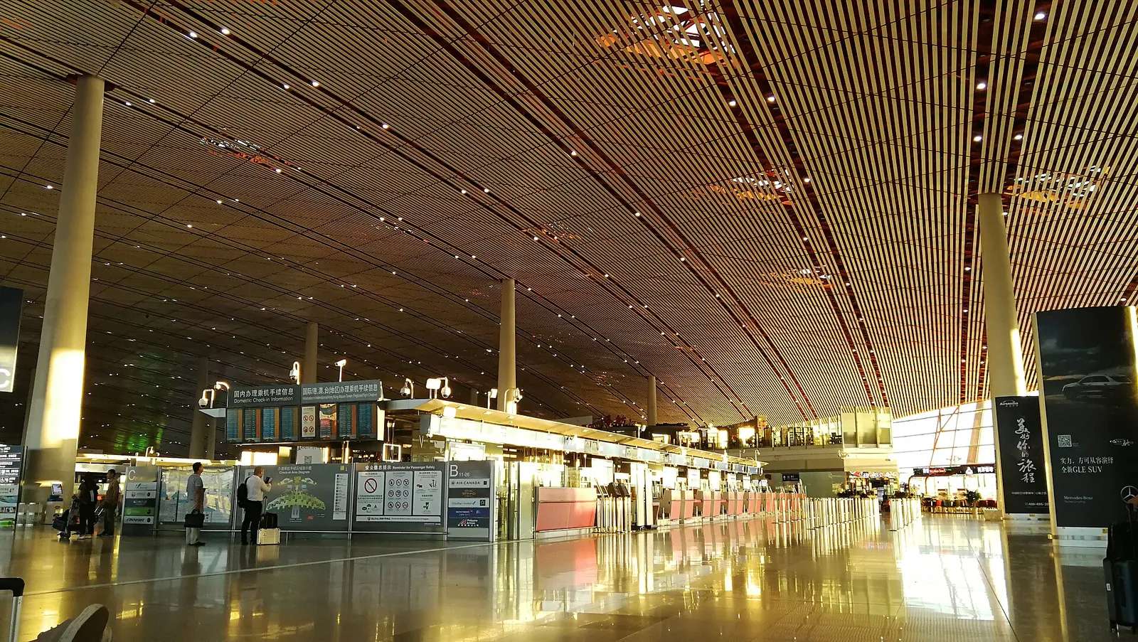 The nearly empty departure hall of Beijing Capital International Airport, Terminal 3, early in the morning.